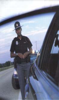 Savannah Police Officer in the mirror at DUI Stop