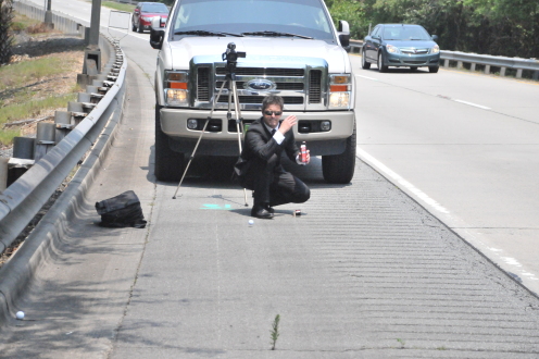 Working - Jason Cerbone, Savannah DUI lawyer rolling golf ball on road - Cerbone DUI Defense Working - Jason Cerbone, Savannah DUI lawyer rolling golf ball on road - Cerbone DUI Defense